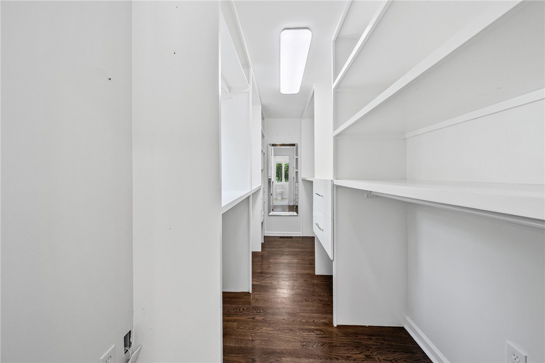 118 Beacon Ridge Circle Salem, SC 29676 - Photo 19 of 45 Custom shelving and hanging space define this spacious walk-in closet, offering ample storage solutions.