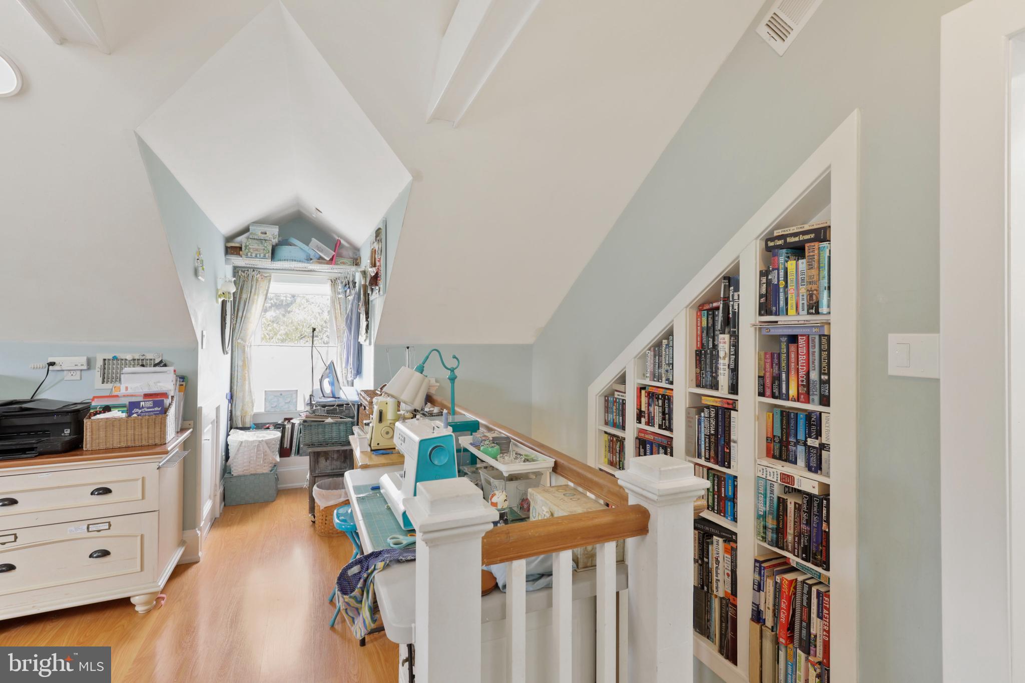 500 State Street Annapolis, MD 21403 - Photo 24 of 44 Staircase ascending to the 3rd floor & Bookcases