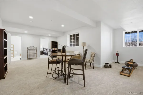 a room with furniture and a flat screen tv