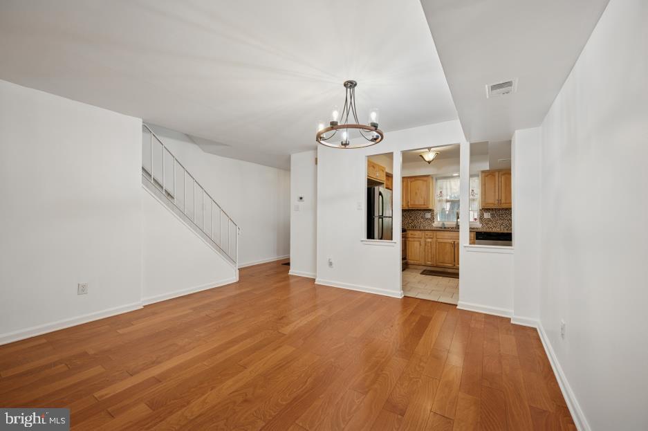 449 West School House Lane Philadelphia, PA 19144 - Photo 5 of 13 a view of empty room with wooden floor