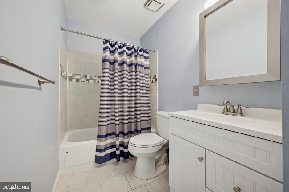 449 West School House Lane Philadelphia, PA 19144 - Photo 9 of 13 a bathroom with a sink a toilet and shower