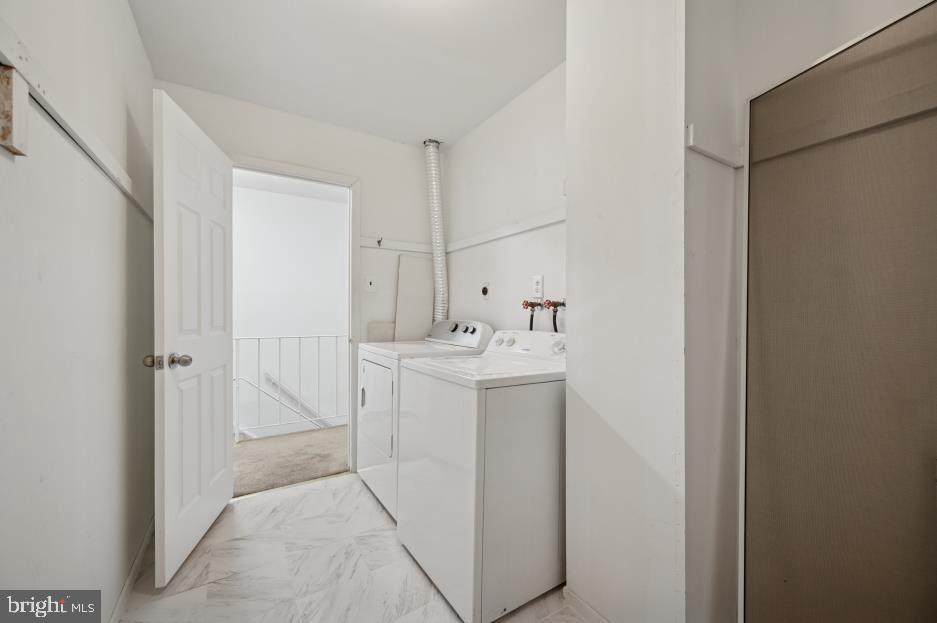 449 West School House Lane Philadelphia, PA 19144 - Photo 10 of 13 a utility room with cabinets washer and dryer
