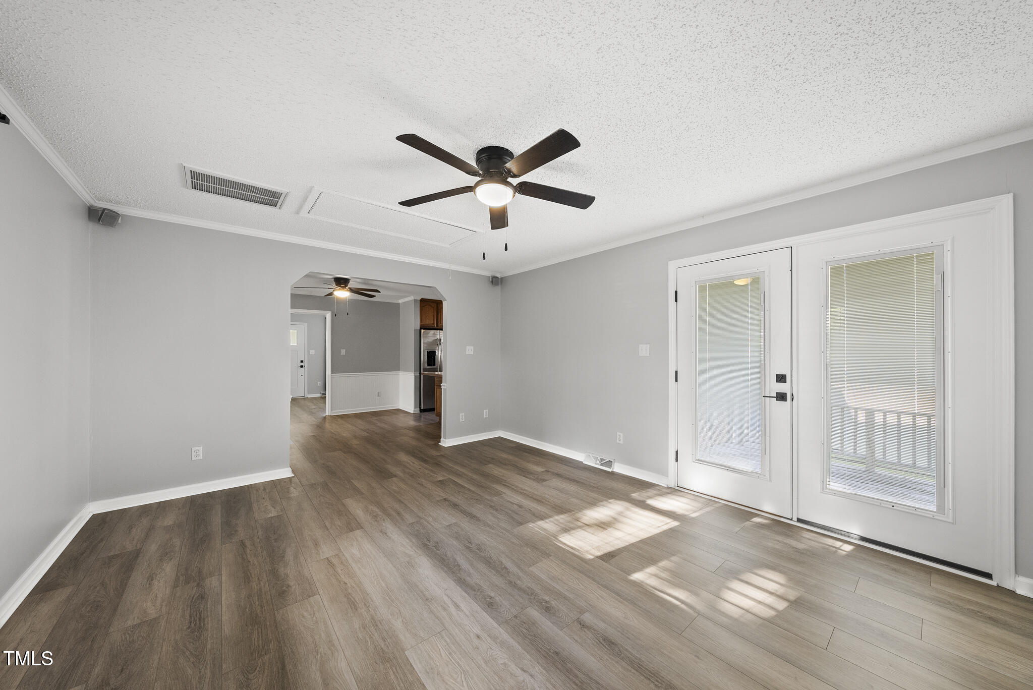 4500 Castlebar Drive Raleigh, NC 27604 - Photo 24 of 36 wooden floor in an empty room with a window