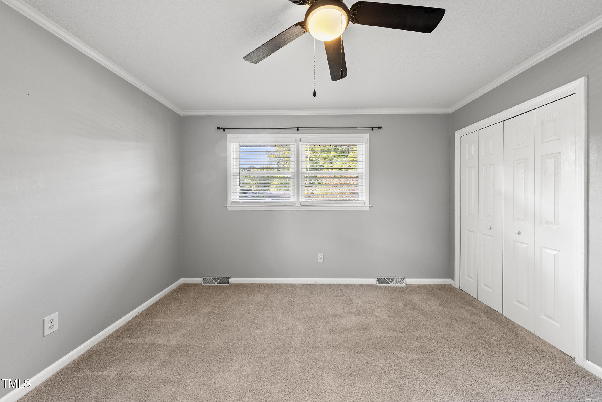 4500 Castlebar Drive Raleigh, NC 27604 - Photo 36 of 36 a view of room with a ceiling fan and a window
