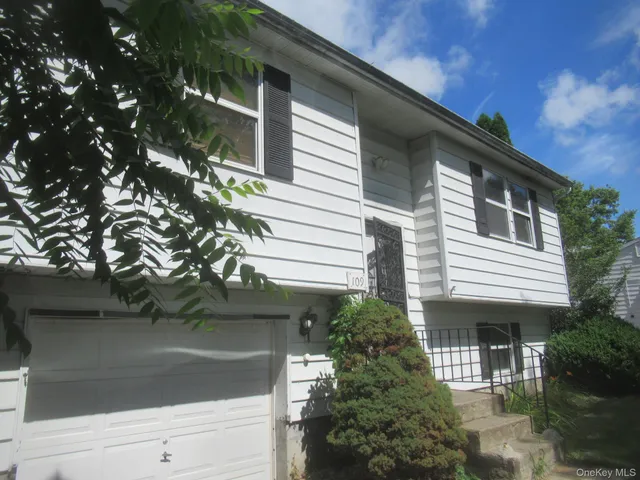 a house view with a outdoor space