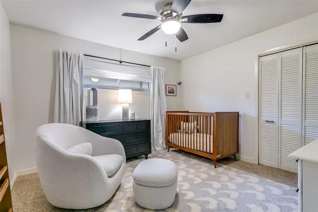 a room with furniture and a rug