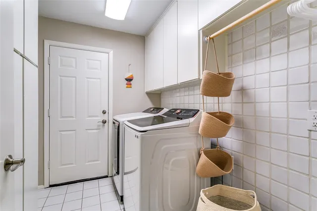 a kitchen with a sink and a stove