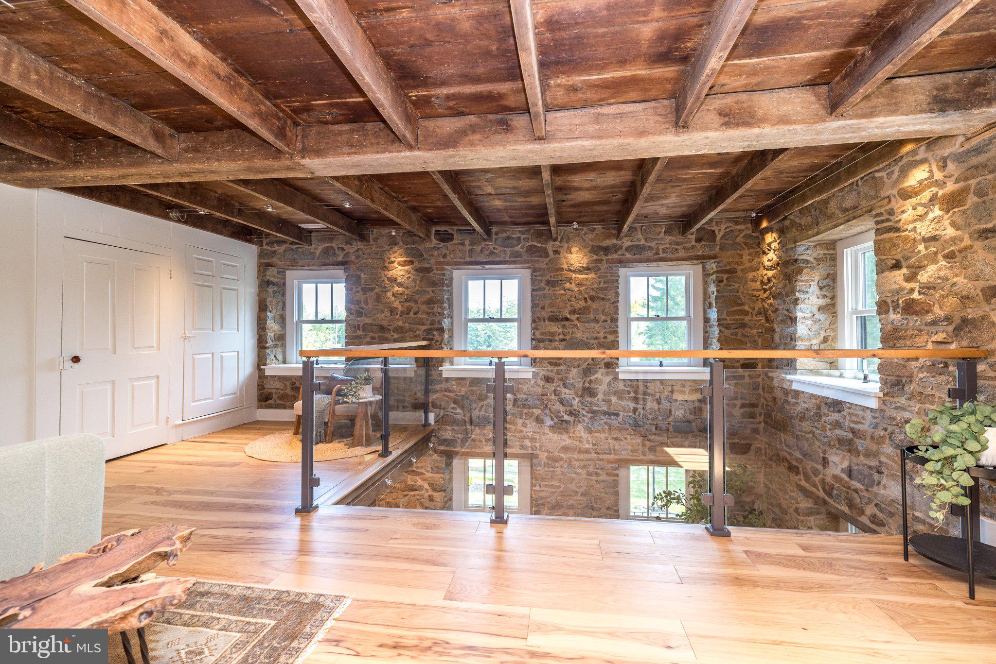 389 Reservoir Road Quakertown, PA 18951 - Photo 40 of 74 Third Bedroom with Exposed Beams & Stone Walls