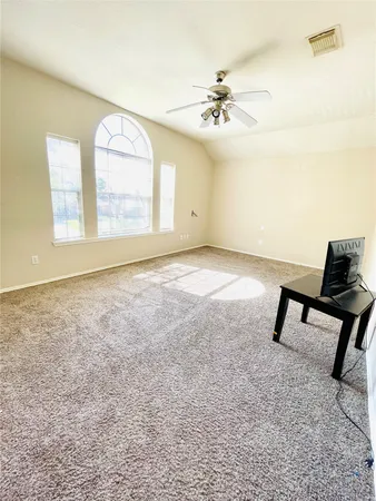 a view of empty room with a window