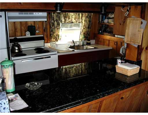 752 W Road Portage Lake, ME 04768 - Photo 8 of 24 Kitchen. Granite counter /Kitchen