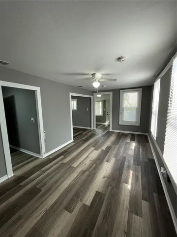 wooden floor in a hall with an entryway