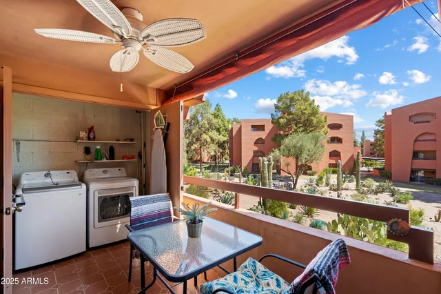 a bathroom with a shower and toilet