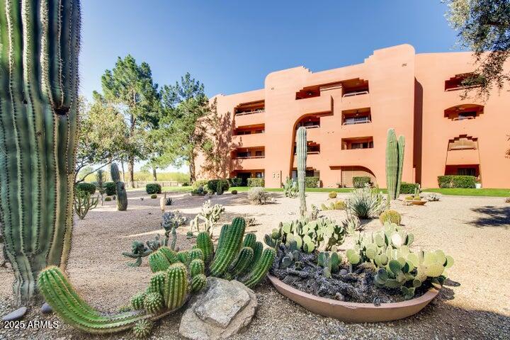 4303 East Cactus Road, Unit 222 Phoenix, AZ 85032 - Photo 29 of 38 a building view with a outdoor space