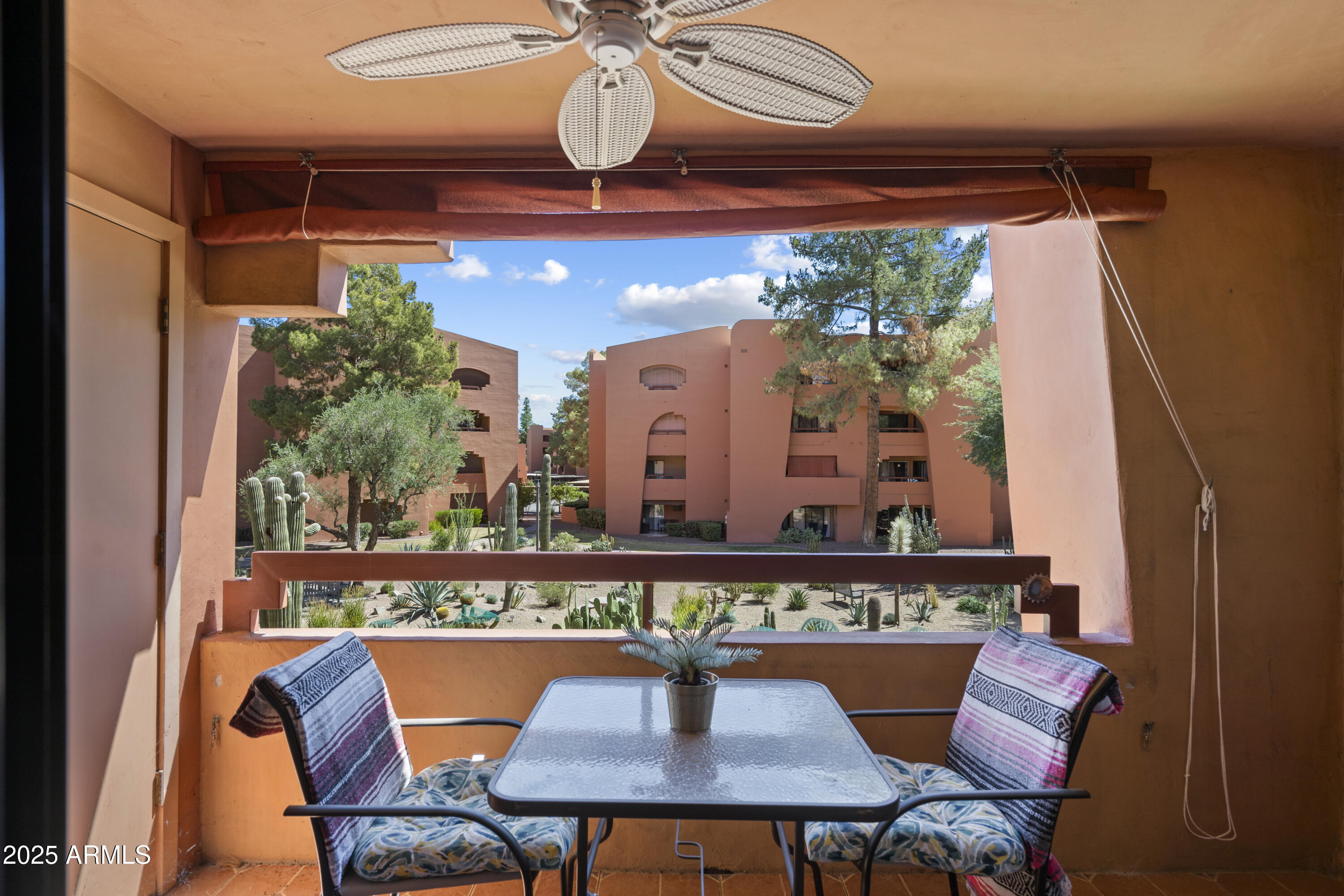 4303 East Cactus Road, Unit 222 Phoenix, AZ 85032 - Photo 3 of 38 a dining room with furniture and window