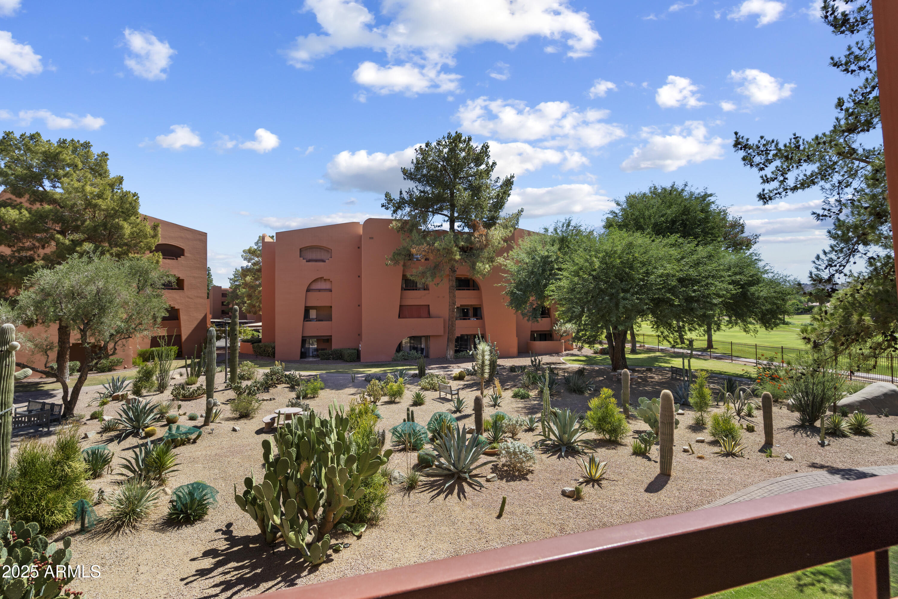 4303 East Cactus Road, Unit 222 Phoenix, AZ 85032 - Photo 5 of 38 a view of a house with a yard