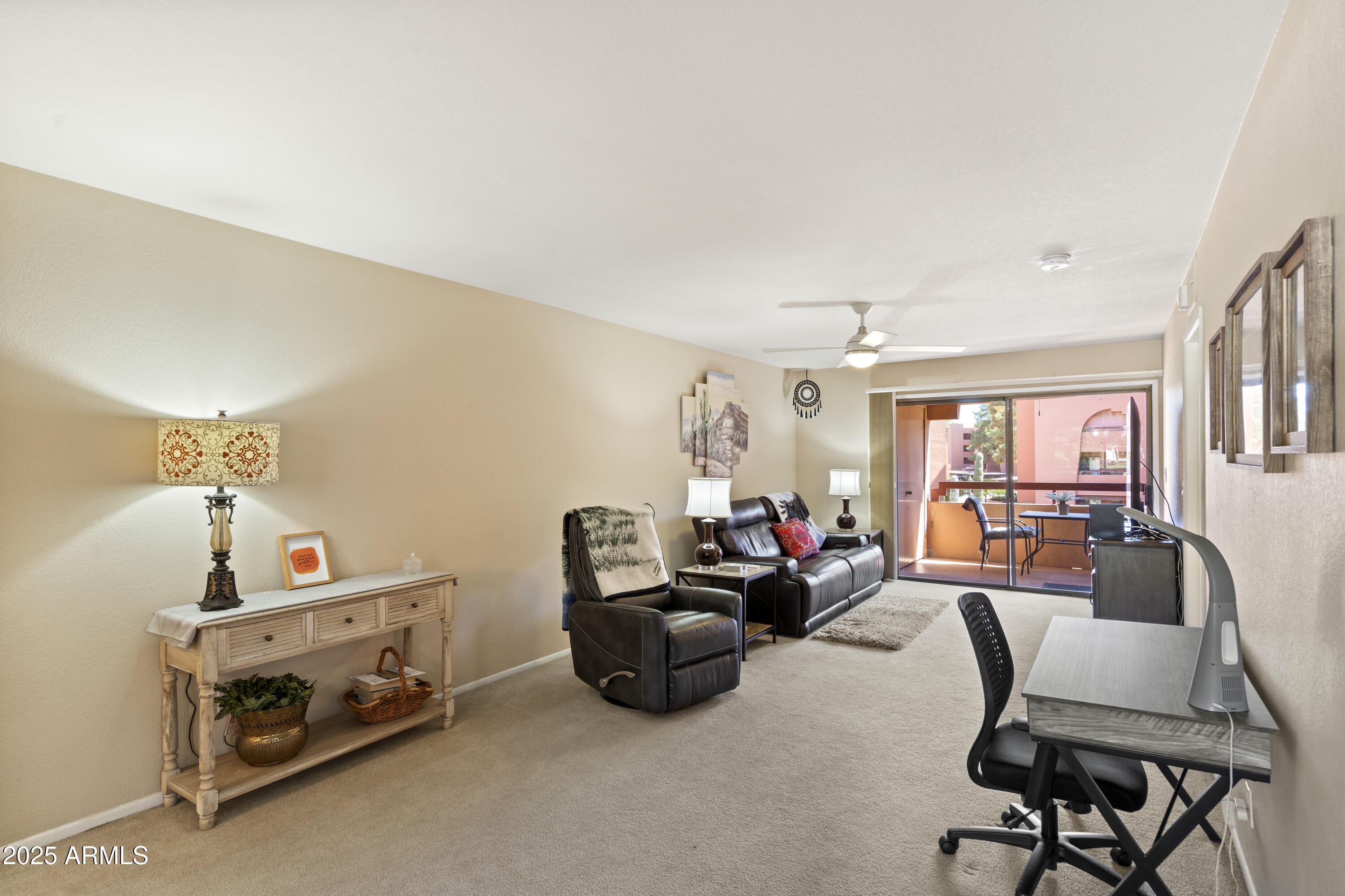 4303 East Cactus Road, Unit 222 Phoenix, AZ 85032 - Photo 8 of 38 a bedroom with furniture and a window