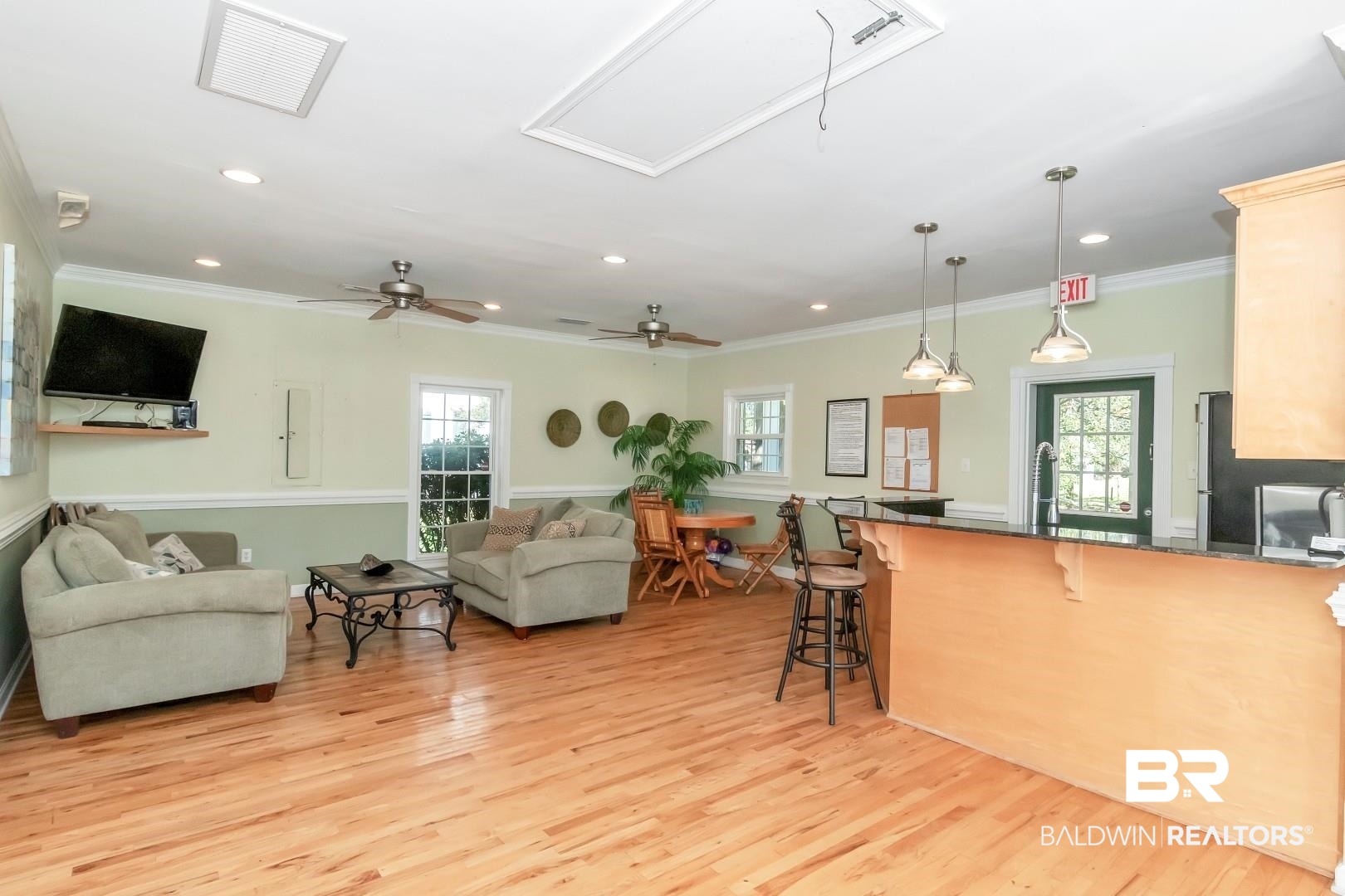214 Upham Street, Unit 4A Mobile, AL 36607 - Photo 8 of 23 Living room with visible vents, plenty of natural light, and light wood-style floors