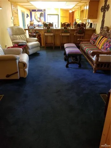 a living room with furniture and a couch