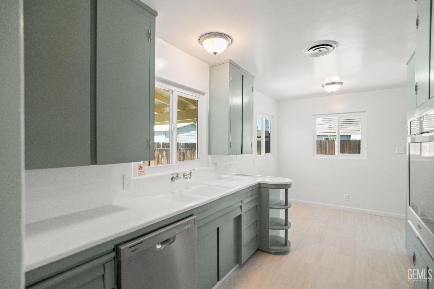 Undisclosed Address Bakersfield, CA 93304 - Photo 16 of 41 a bathroom with a sink and a mirror