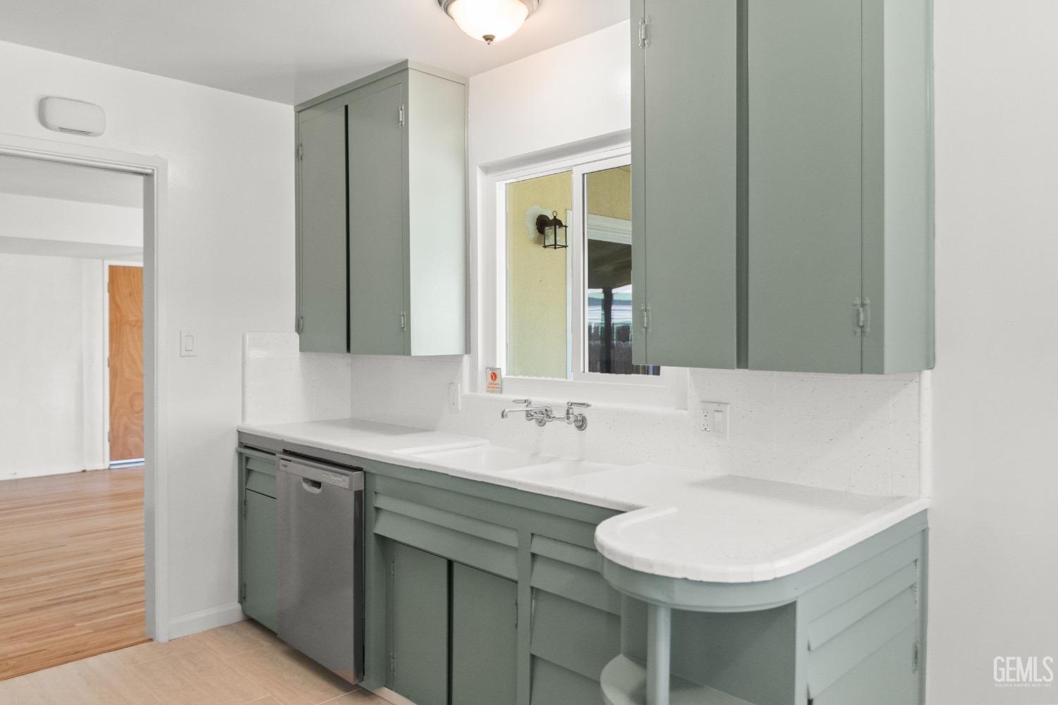 Undisclosed Address Bakersfield, CA 93304 - Photo 18 of 41 a bathroom with a sink and a mirror