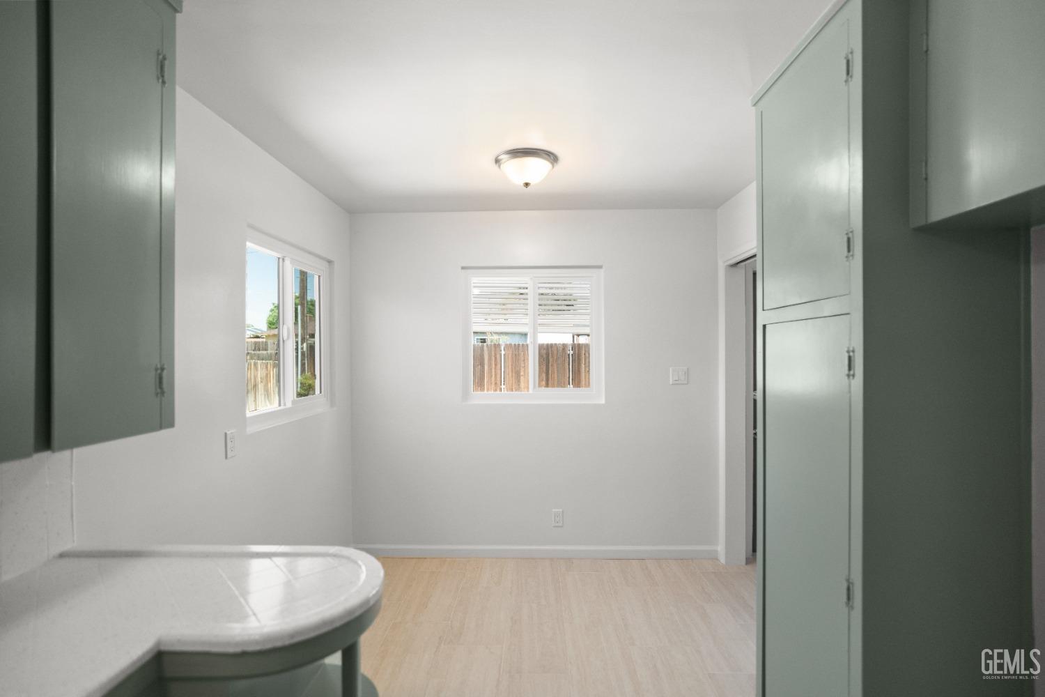 Undisclosed Address Bakersfield, CA 93304 - Photo 19 of 41 a bathroom with a sink a toilet and mirror