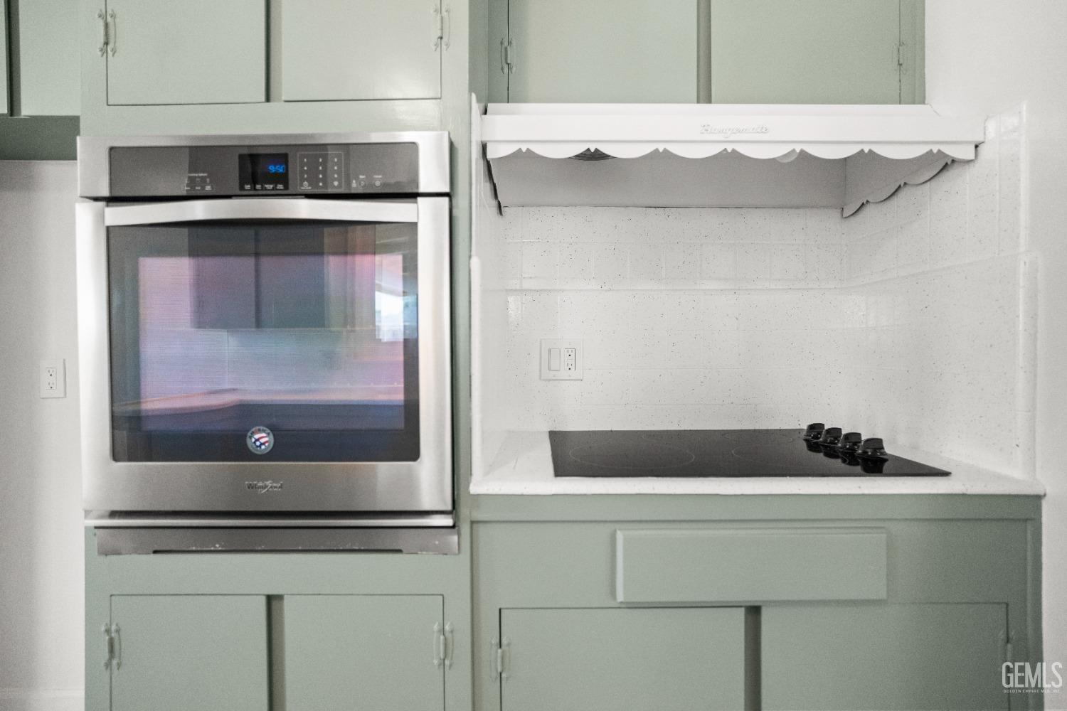 Undisclosed Address Bakersfield, CA 93304 - Photo 20 of 41 a bathroom with a sink and a mirror