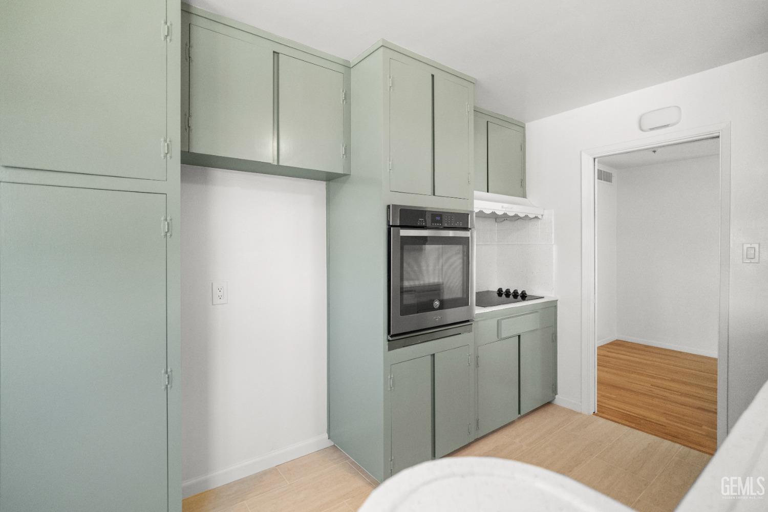 Undisclosed Address Bakersfield, CA 93304 - Photo 23 of 41 a kitchen with stainless steel appliances a refrigerator and a sink