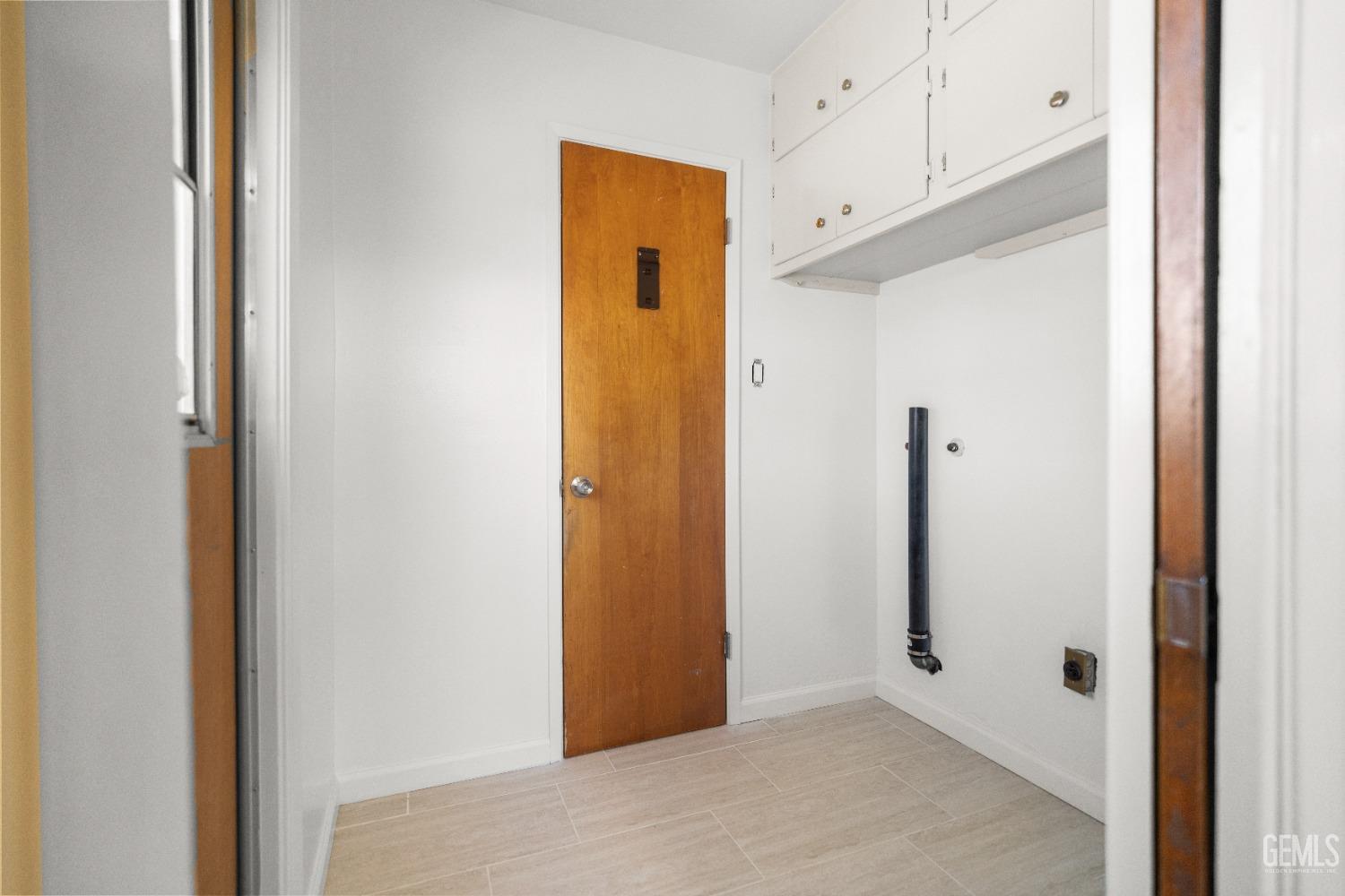 Undisclosed Address Bakersfield, CA 93304 - Photo 25 of 41 a view of a hallway with closet area