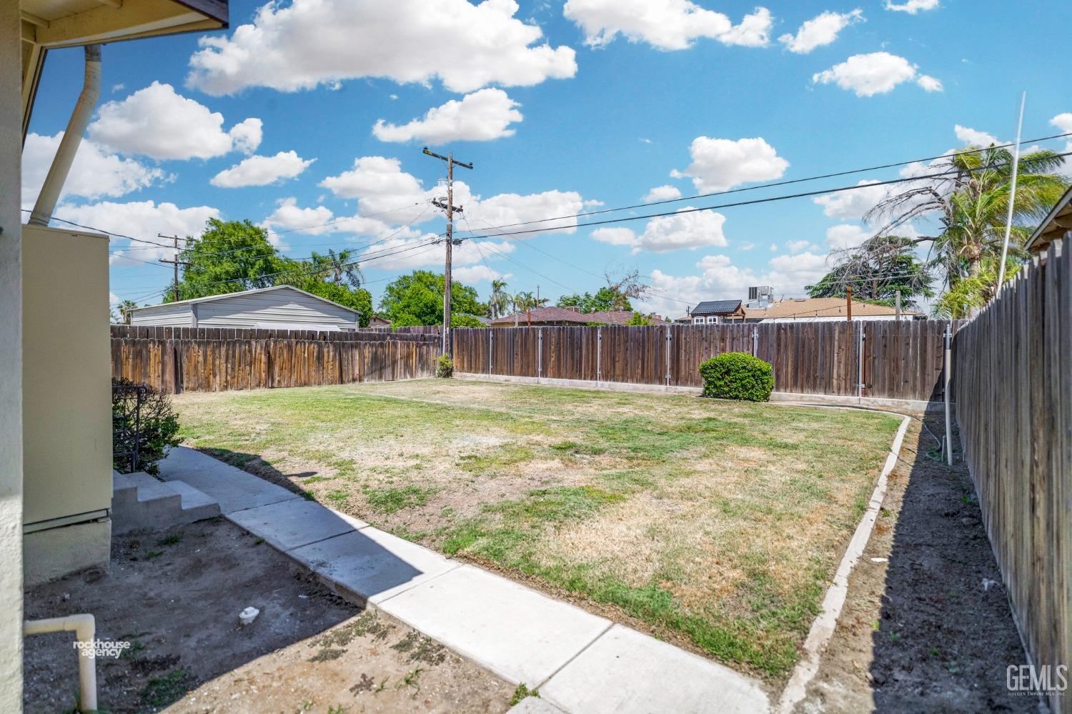 Undisclosed Address Bakersfield, CA 93304 - Photo 38 of 41 a view of a backyard with a garden