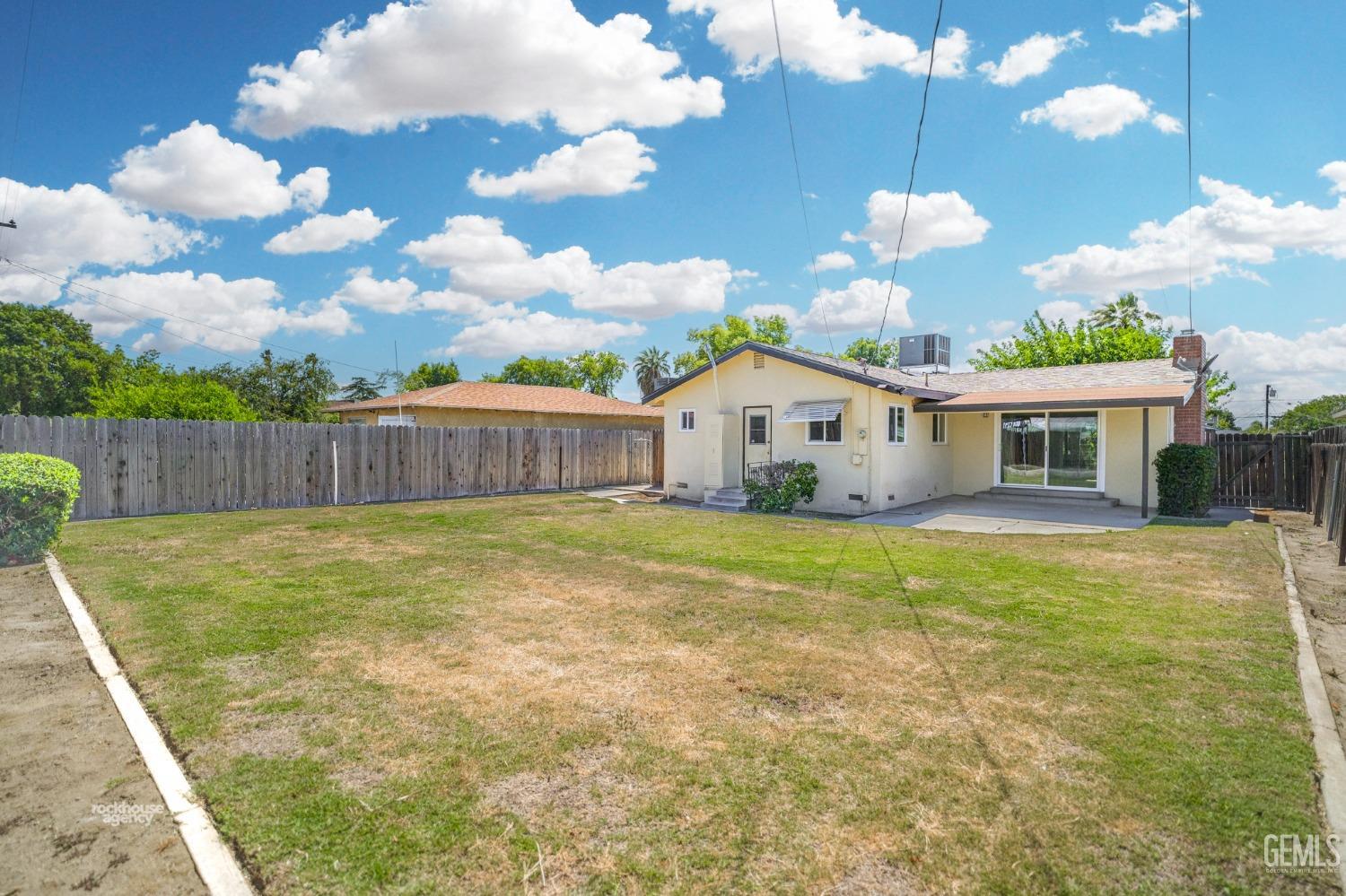 Undisclosed Address Bakersfield, CA 93304 - Photo 39 of 41 a view of a house with backyard and sitting area