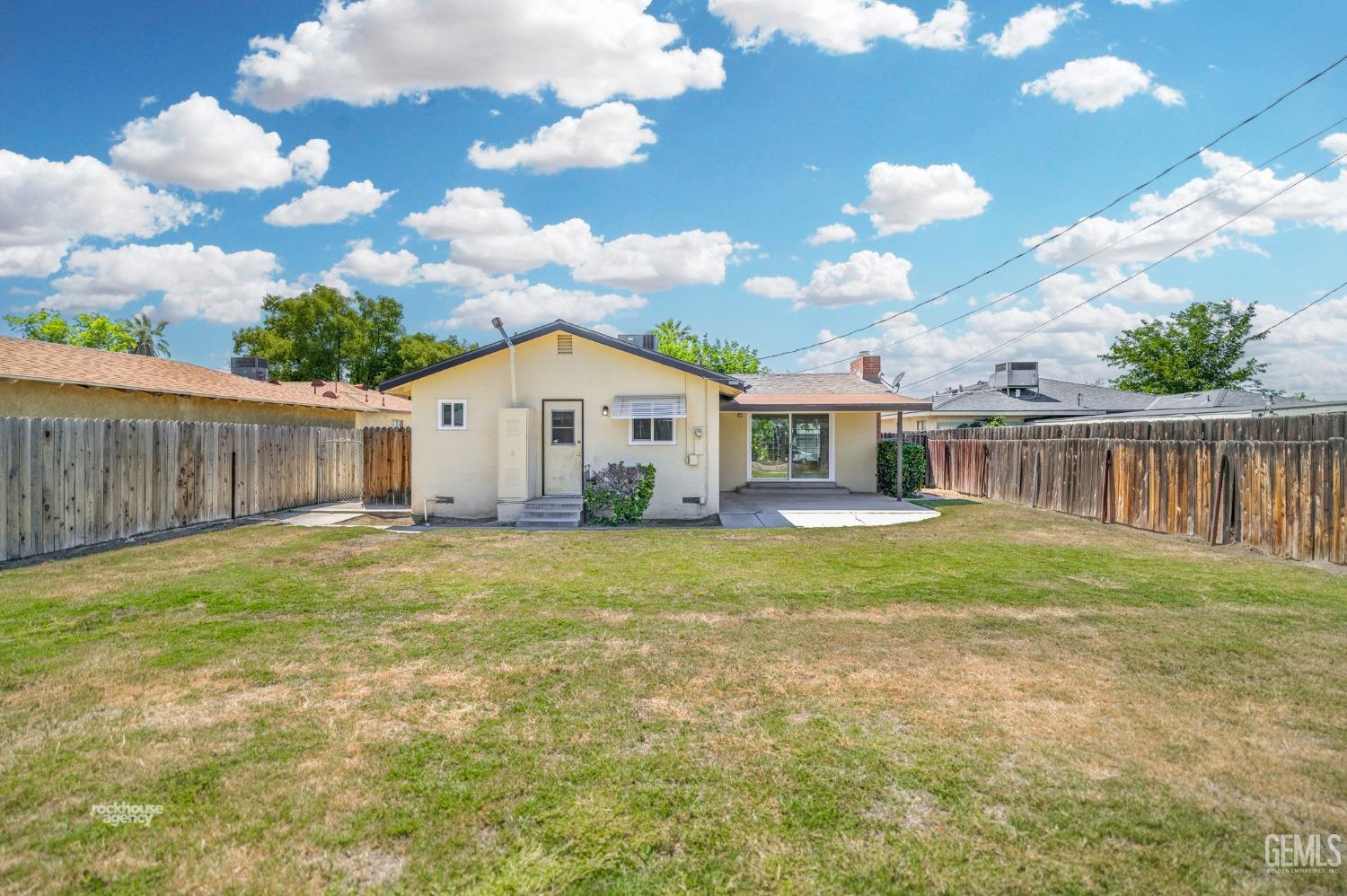 Undisclosed Address Bakersfield, CA 93304 - Photo 40 of 41 a view of a house with backyard and sitting area