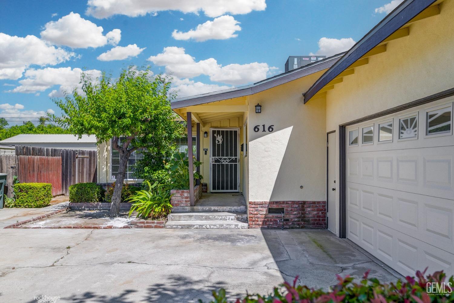 Undisclosed Address Bakersfield, CA 93304 - Photo 6 of 41 a view of a back yard of the house