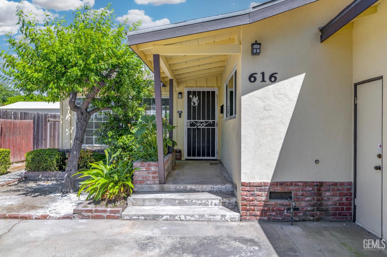 Undisclosed Address Bakersfield, CA 93304 - Photo 7 of 41 a view of a entryway door of the house