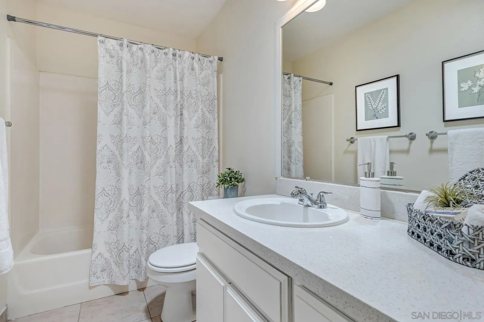 4607 Briar Ridge Road Oceanside, CA 92056 - Photo 18 of 32 a bathroom with a sink toilet and shower