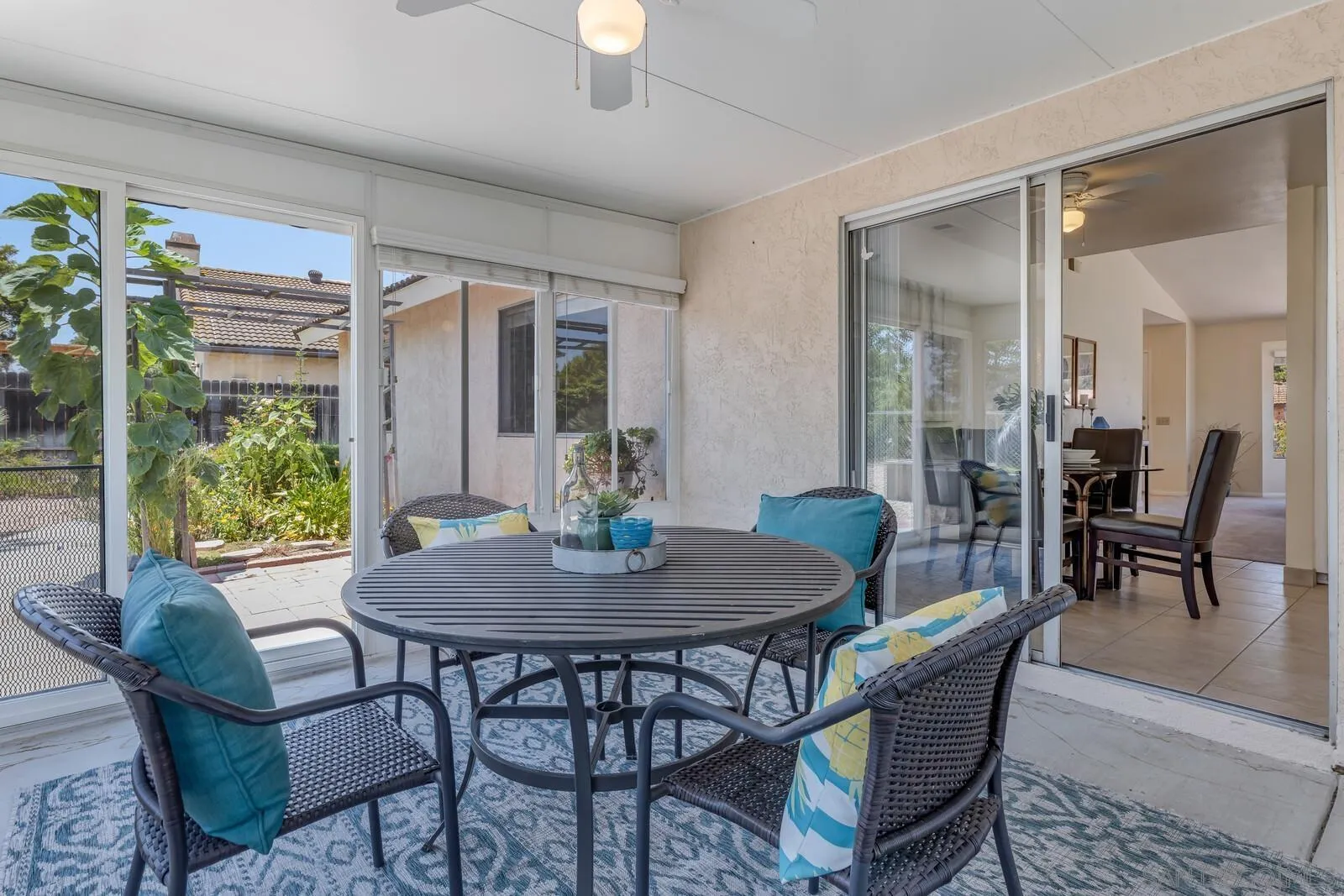 4607 Briar Ridge Road Oceanside, CA 92056 - Photo 20 of 32 a view of a dining room with furniture window and outside view