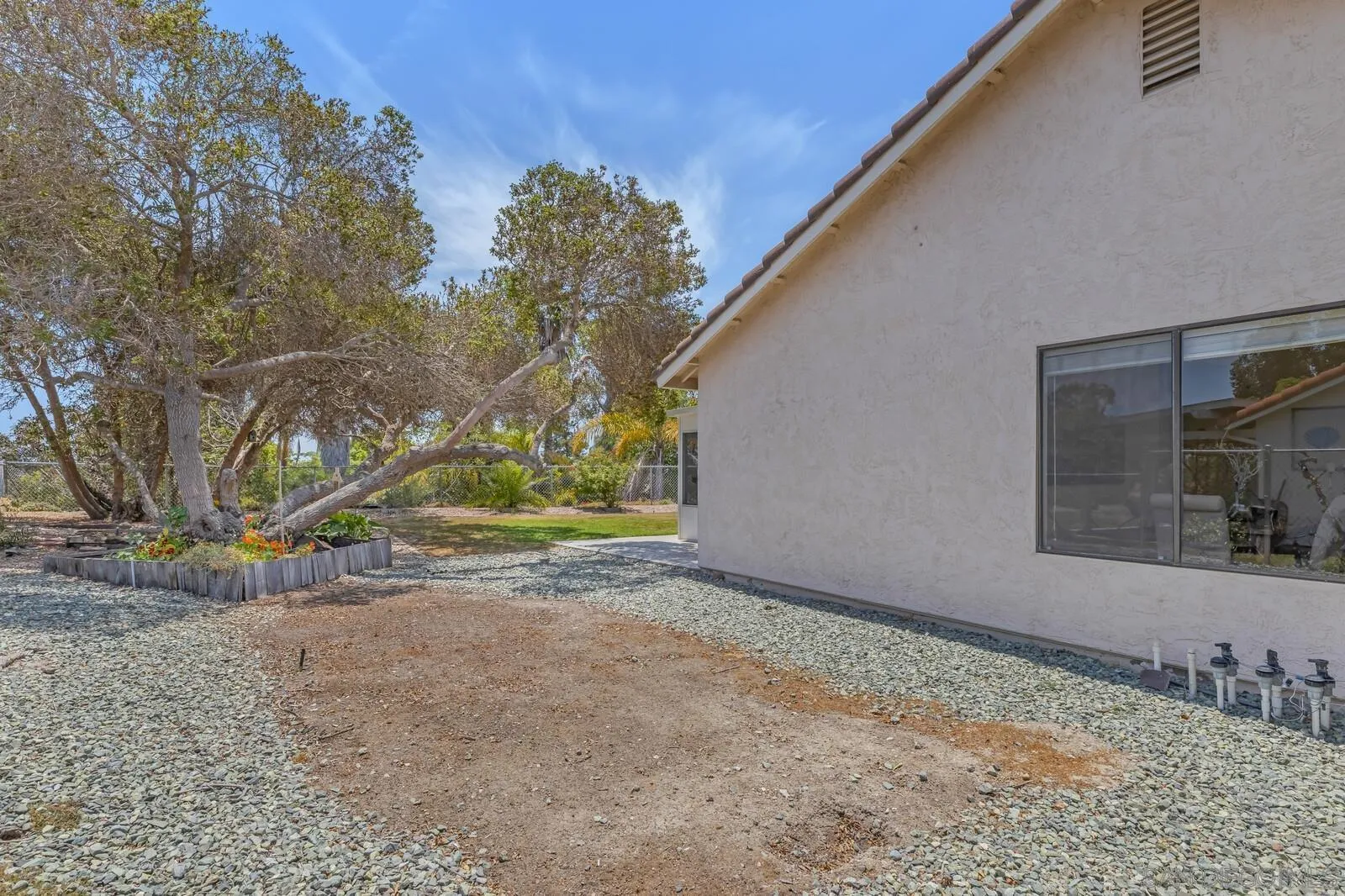 4607 Briar Ridge Road Oceanside, CA 92056 - Photo 23 of 32 a view of backyard with green space