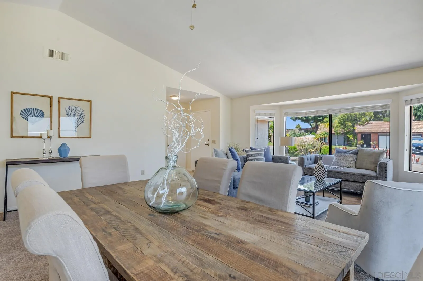 4607 Briar Ridge Road Oceanside, CA 92056 - Photo 8 of 32 a living room with furniture and wooden floor