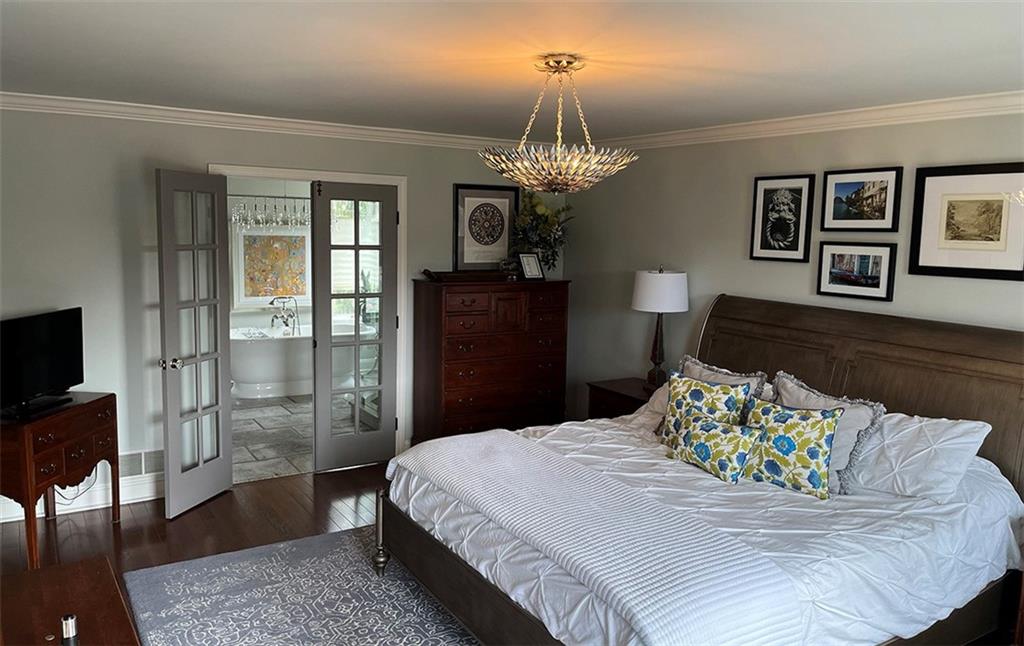 80 Aaron Lane Indiana, PA 15701 - Photo 12 of 25 a spacious bedroom with a bed and wooden floor