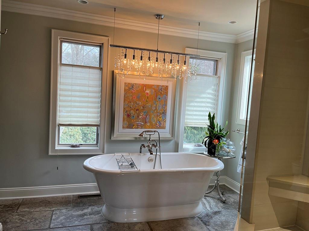 80 Aaron Lane Indiana, PA 15701 - Photo 15 of 25 a white bath tub sitting in a bathroom next to a window