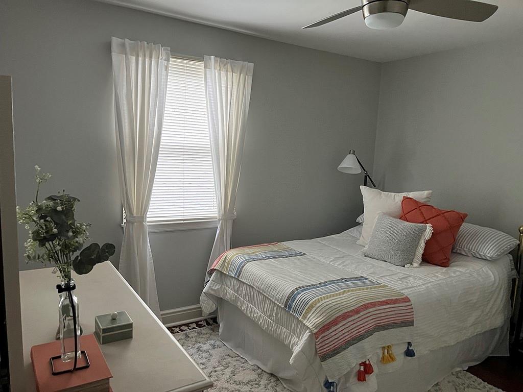 80 Aaron Lane Indiana, PA 15701 - Photo 18 of 25 a bedroom with a bed and a potted plant