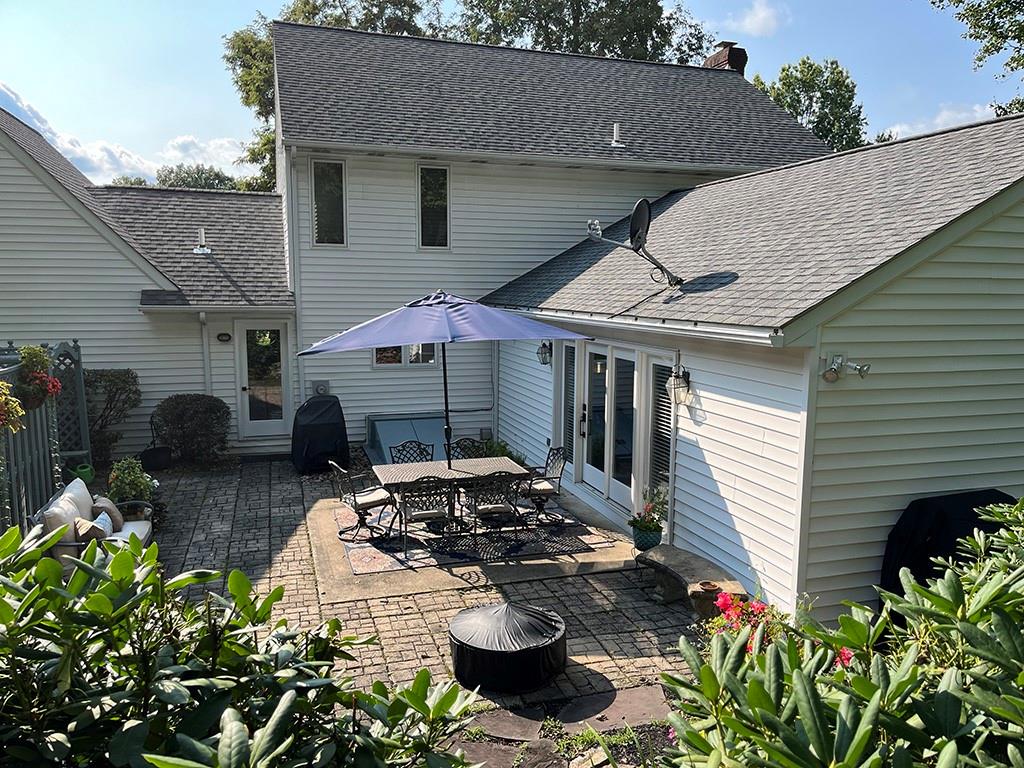 80 Aaron Lane Indiana, PA 15701 - Photo 2 of 25 a view of a patio with table and chairs potted plants