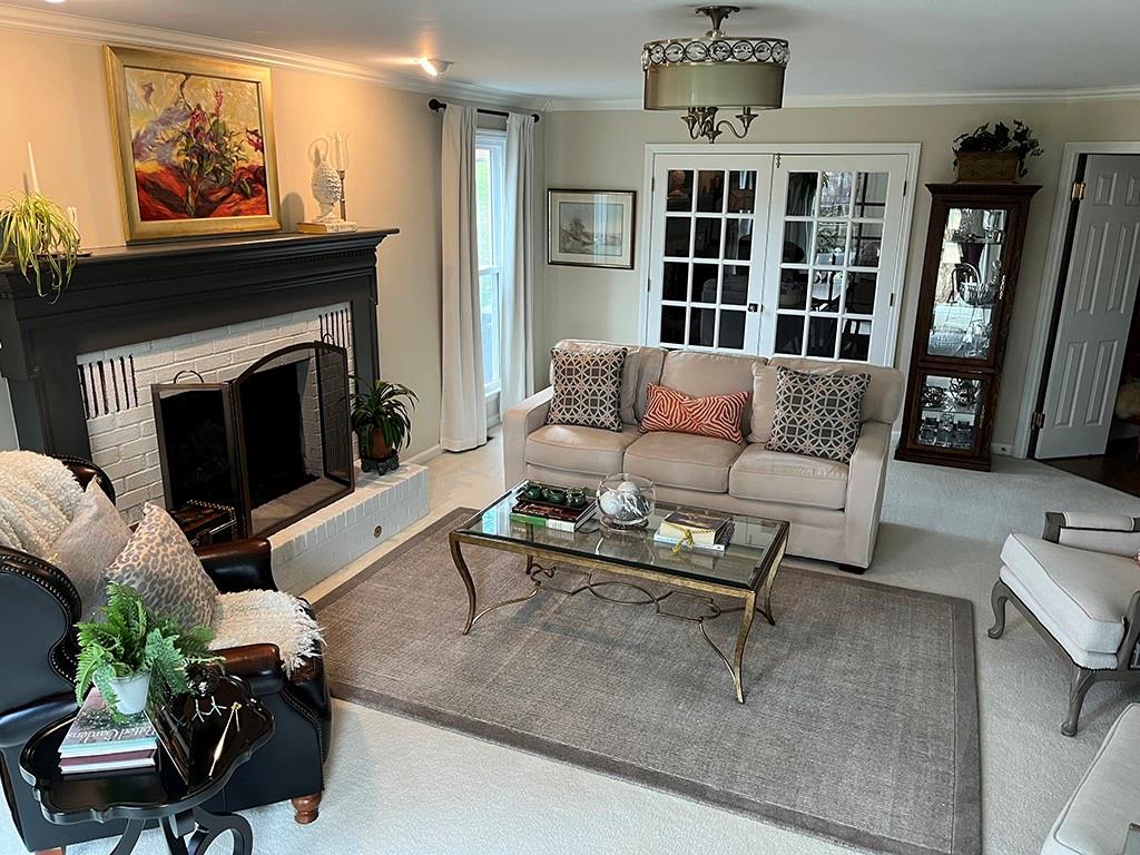 80 Aaron Lane Indiana, PA 15701 - Photo 3 of 25 a living room with furniture a fireplace and a flat screen tv