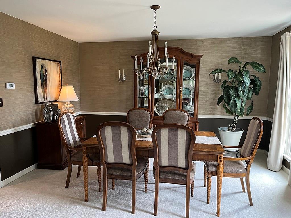 80 Aaron Lane Indiana, PA 15701 - Photo 7 of 25 a view of a dining room with furniture and chandelier