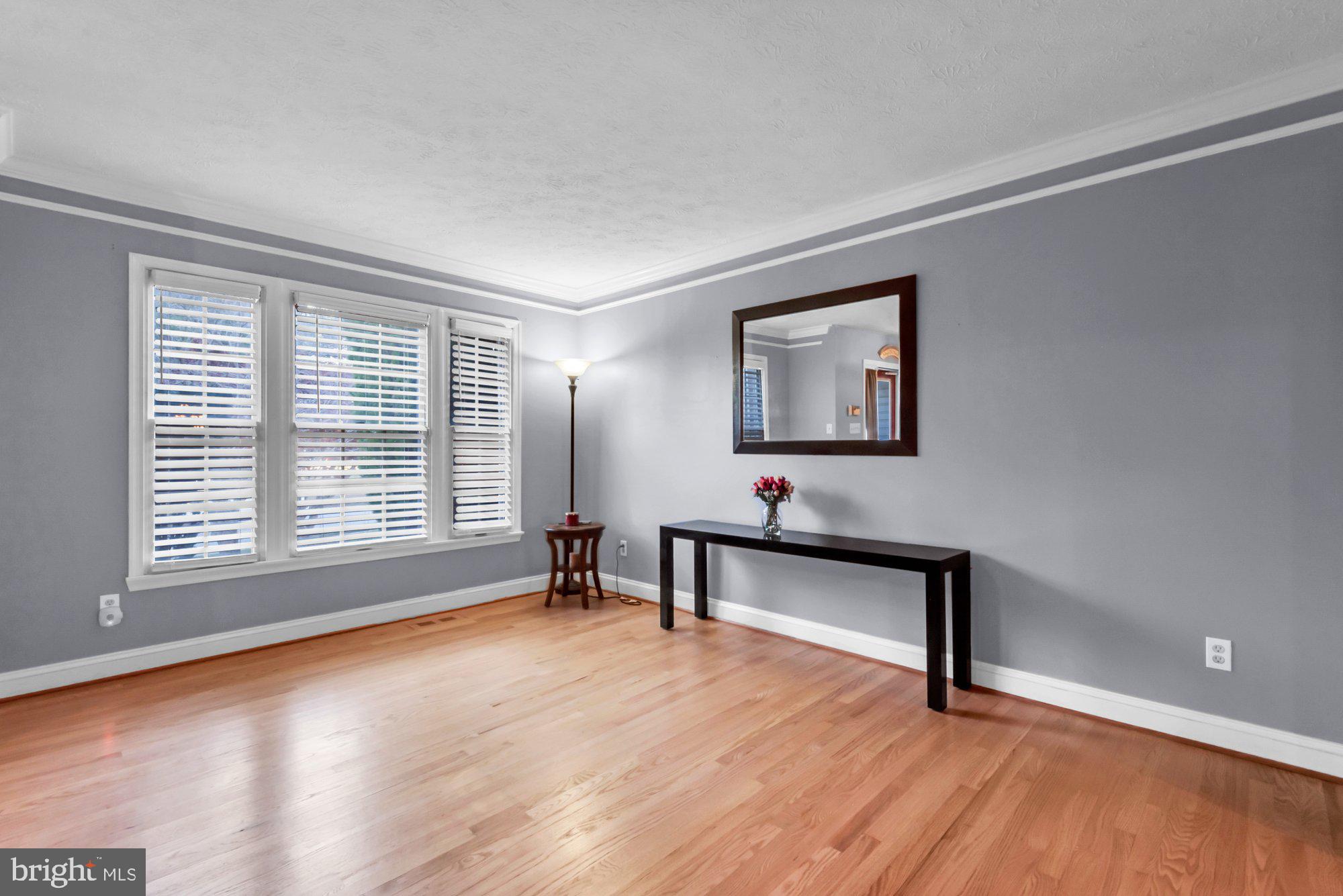 604 Academy Avenue Owings Mills, MD 21117 - Photo 11 of 51 a view of a livingroom with wooden floor and a window