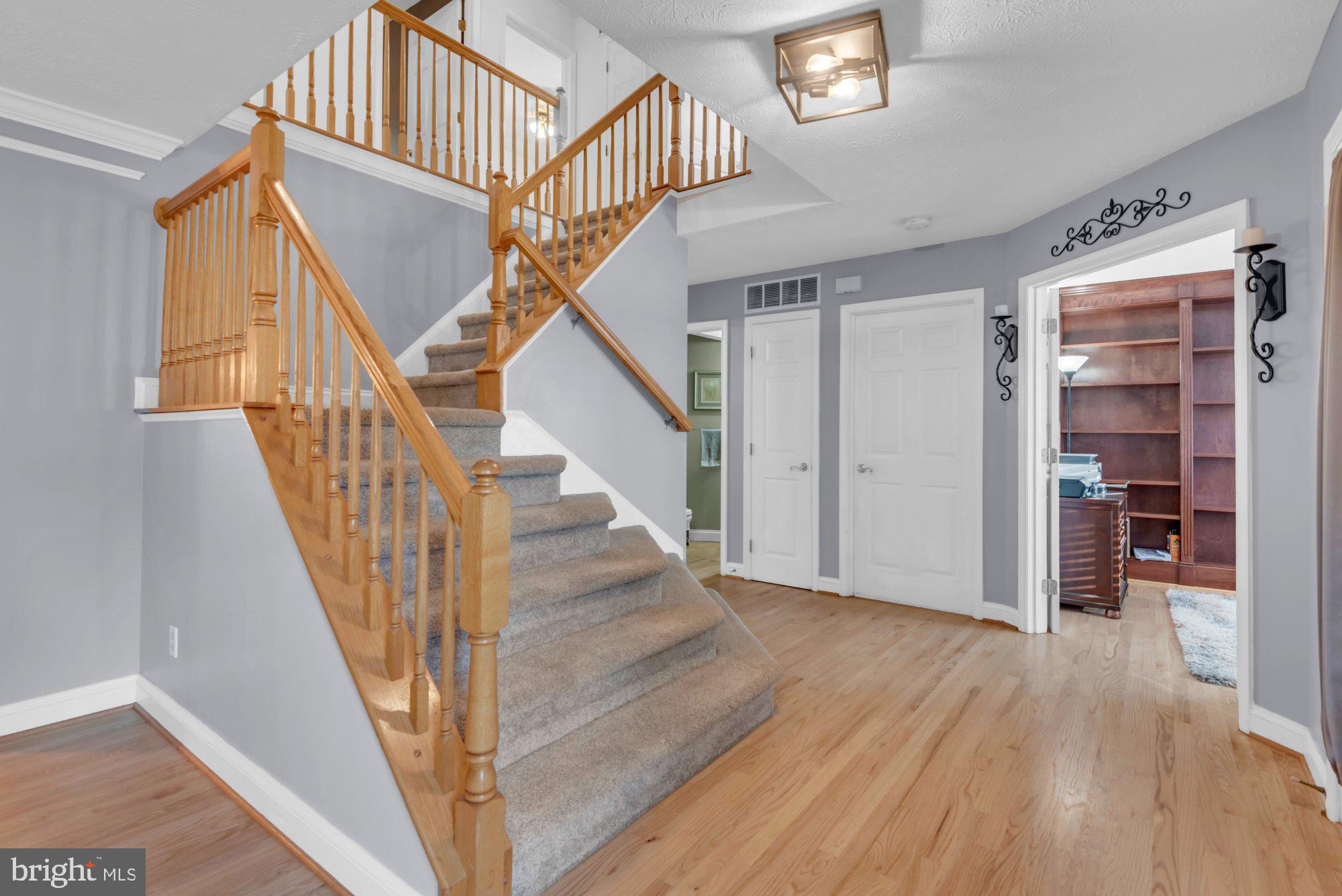 604 Academy Avenue Owings Mills, MD 21117 - Photo 18 of 51 a view of entryway and hall with wooden floor