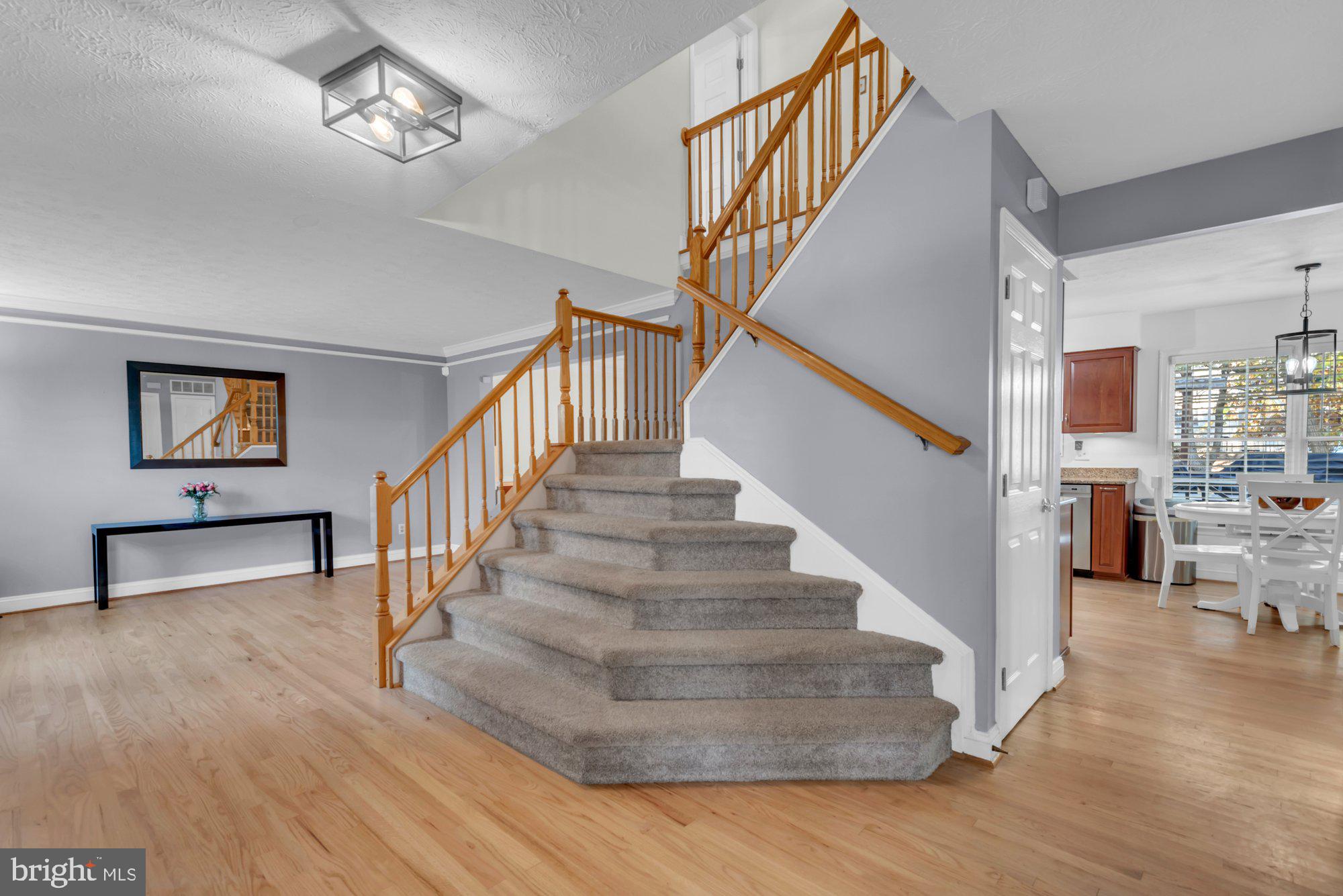 604 Academy Avenue Owings Mills, MD 21117 - Photo 2 of 51 a view of entryway and hall with wooden floor