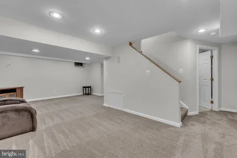 a view of a livingroom with a staircase