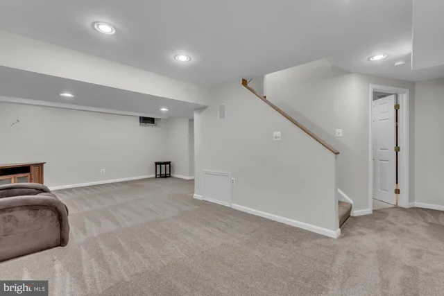 a view of a livingroom with a staircase