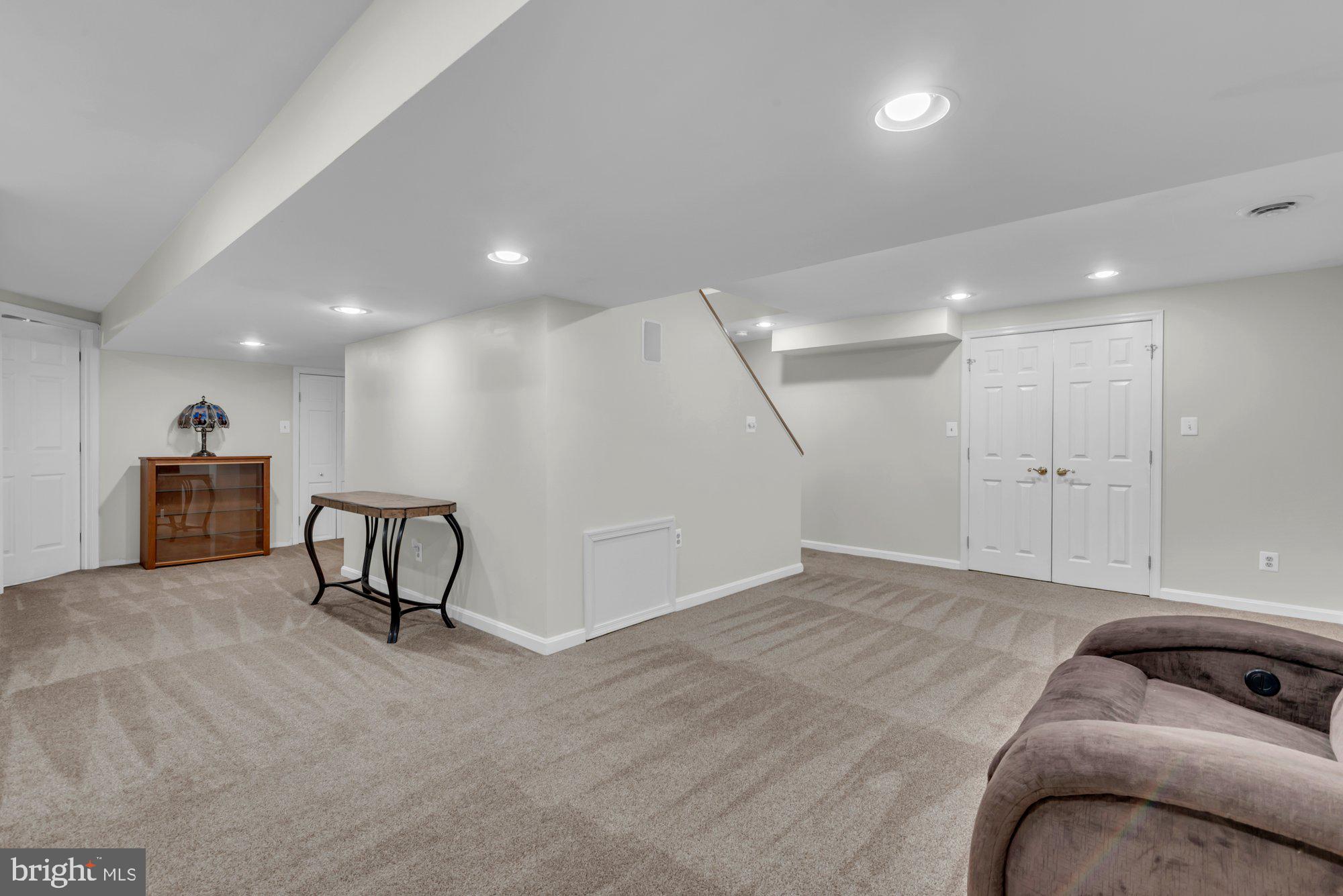 604 Academy Avenue Owings Mills, MD 21117 - Photo 32 of 51 a view of a livingroom with furniture and staircase