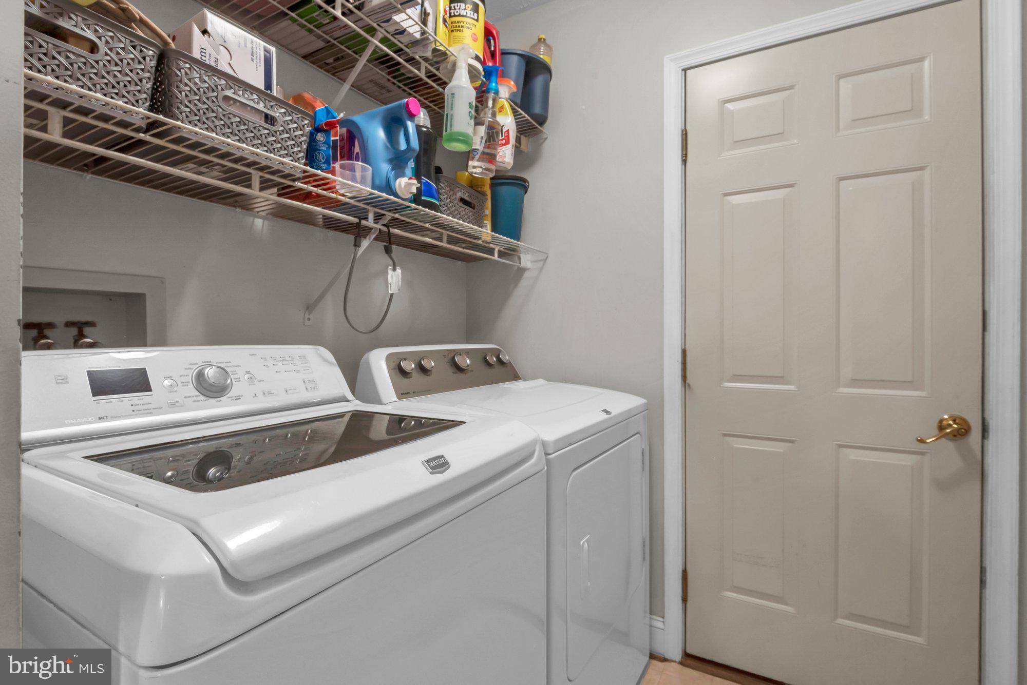 604 Academy Avenue Owings Mills, MD 21117 - Photo 38 of 51 a utility room with dryer and washer